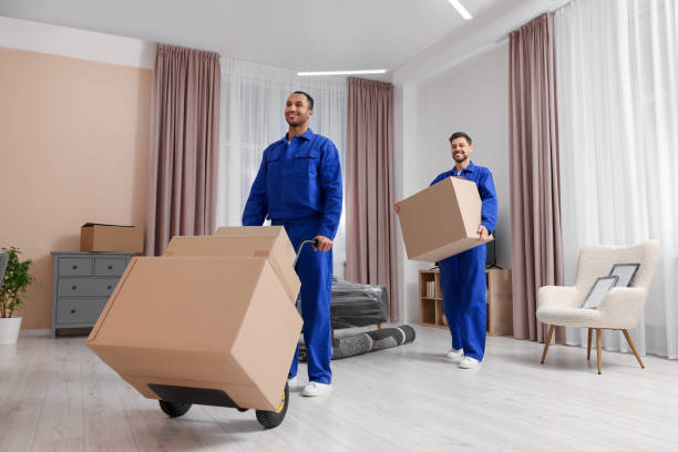 Villa movers in Mirdif Dubai providing professional relocation service with team carefully packing, handling, and loading luxury furniture, sofas, boxes, and household items into a moving truck outside a residential villa.
