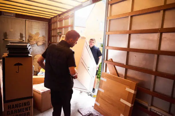 House movers packing furniture in Discovery Garden Dubai